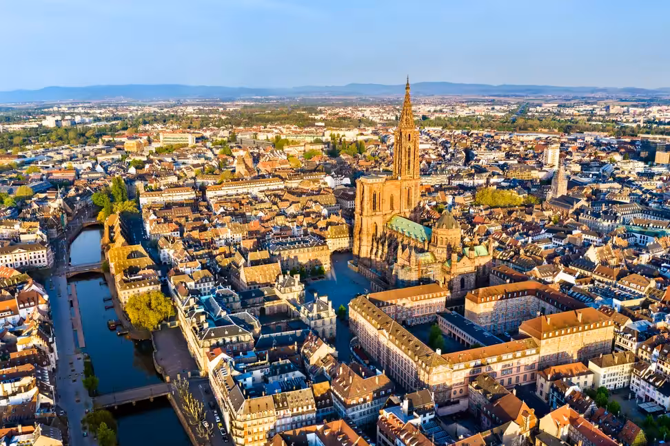 Strasbourg Cathedral above the rooftops of the city centre, seen from the air.