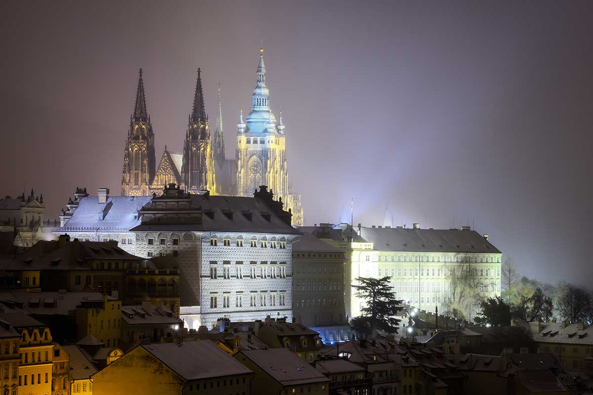 Prague Castle, a sprawling complex overlooking Prague, features St. Vitus Cathedral, the Old Royal Palace, and stunning panoramic views, showcasing centuries of Czech history and architectural grandeur.
