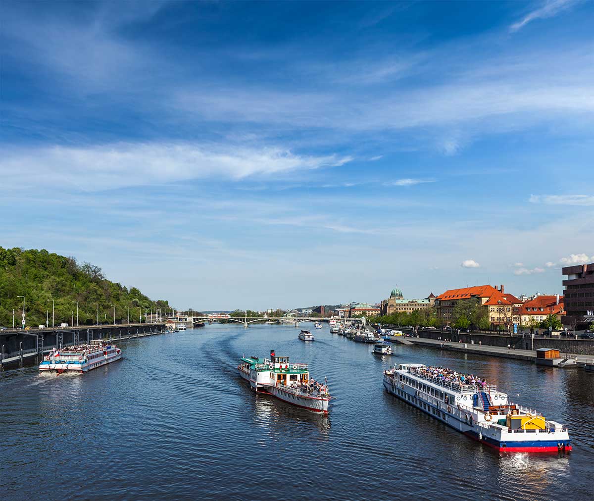 Vltava River boat tours in Prague offer scenic views of iconic landmarks like Prague Castle, Charles Bridge, and the National Theatre, providing a unique perspective of the city's architecture and historical skyline.