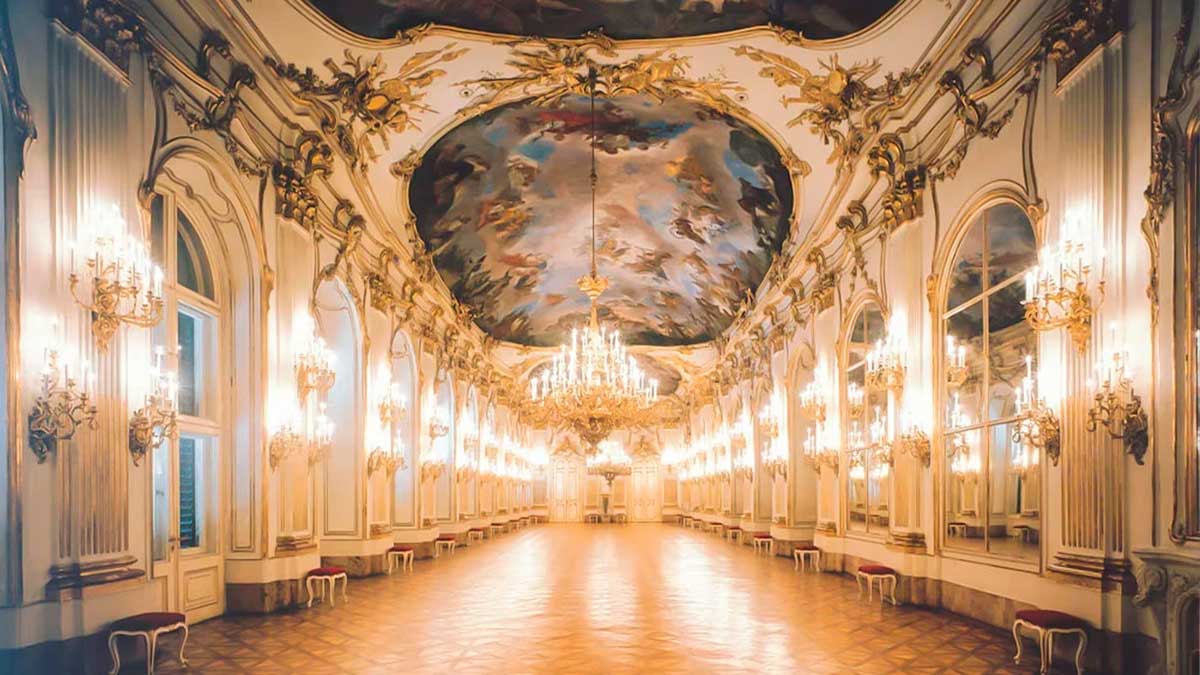 The Schönbrunn Palace's Mirror Room, with its opulent Rococo décor and reflective surfaces, served as a setting for imperial gatherings, and is famously known as the location where a young Mozart performed for Empress Maria Theresa.