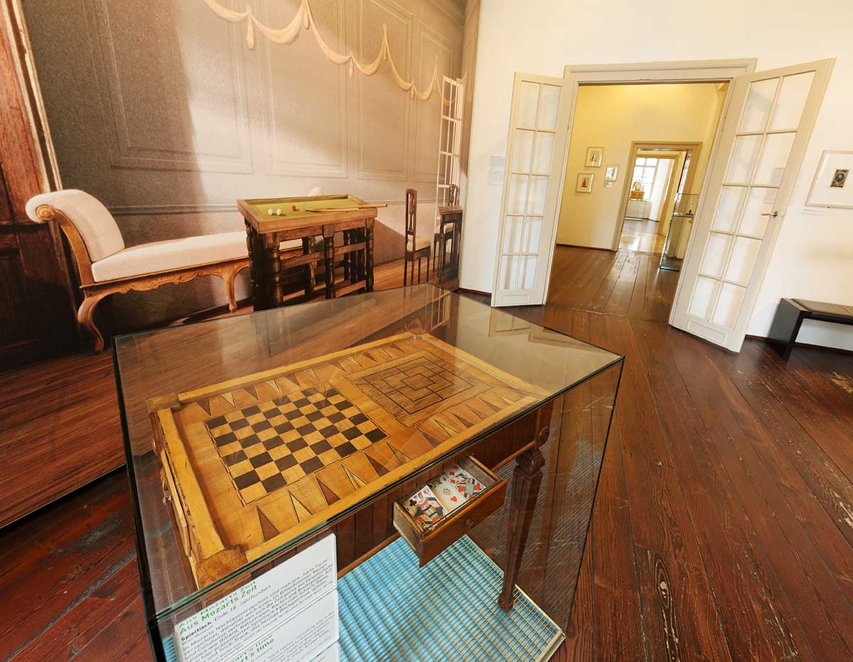 The Inside Mozart's Residence museum in Salzburg displays original artifacts, musical instruments, and historical documents, offering visitors an intimate glimpse into the composer's life and work beyond his birthplace.