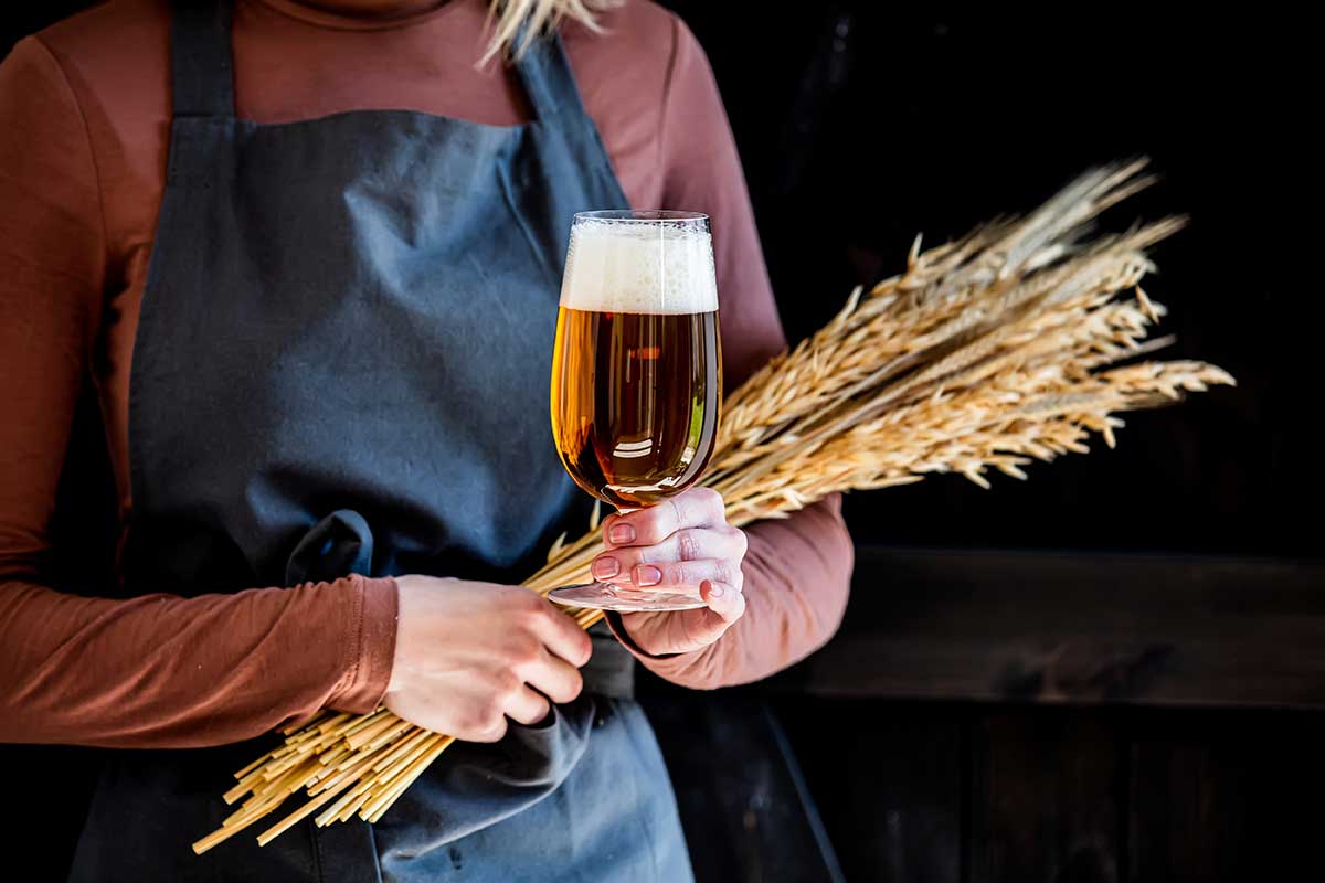Belgian beer, celebrated for its diverse styles, from Trappist ales to fruity lambics, is often served in unique glassware, reflecting the country's rich brewing traditions and complex flavor profiles.