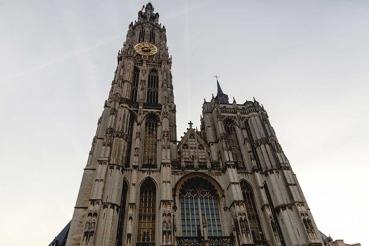 The Cathedral of Our Lady in Antwerp, Belgium, a Gothic masterpiece, boasts soaring spires, intricate stained glass windows, and Rubens's masterpieces, showcasing centuries of artistic and architectural heritage.