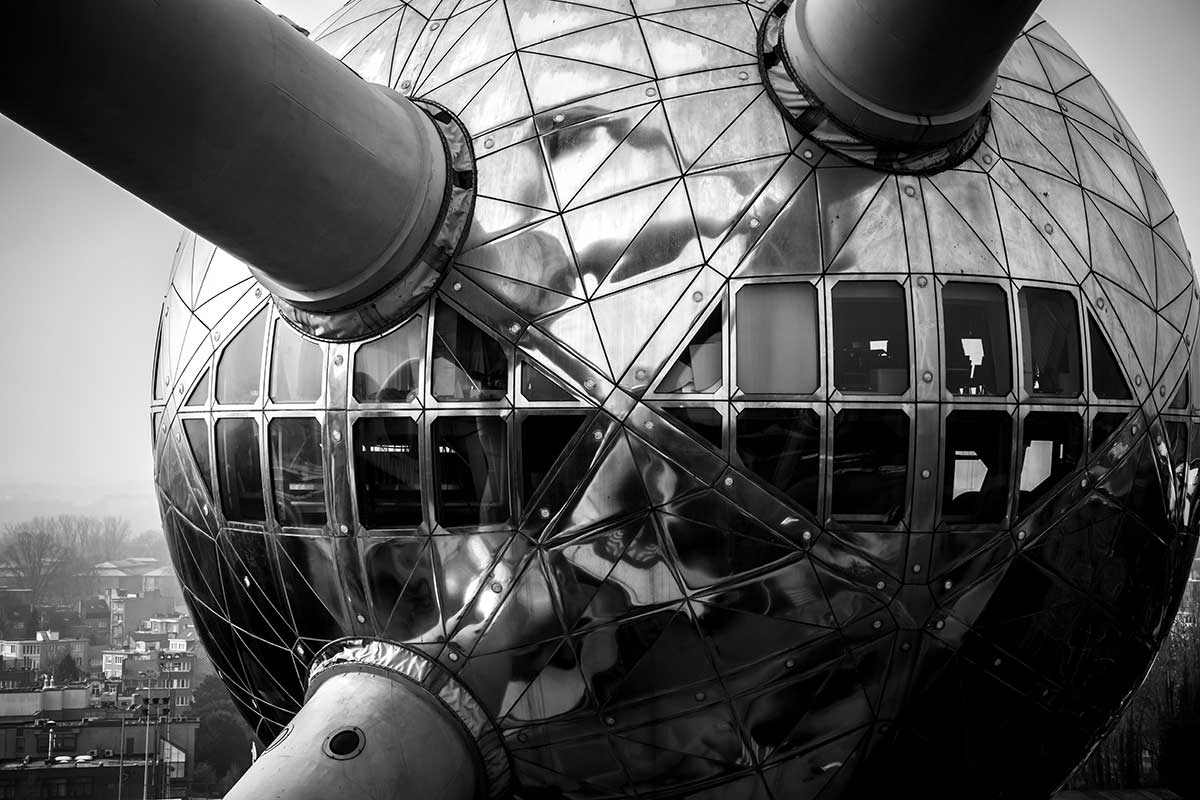 The Atomium, a striking steel structure in Brussels, Belgium, features nine interconnected spheres representing an iron crystal magnified 165 billion times, serving as a symbol of scientific innovation and offering panoramic city views.