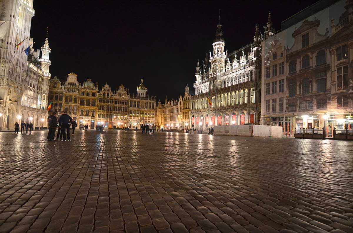 The Brussels Grand Place, a UNESCO World Heritage site, showcases ornate guildhalls with gilded facades, the Gothic City Hall, and vibrant flower markets, creating a stunning architectural ensemble in the heart of the Belgian capital.