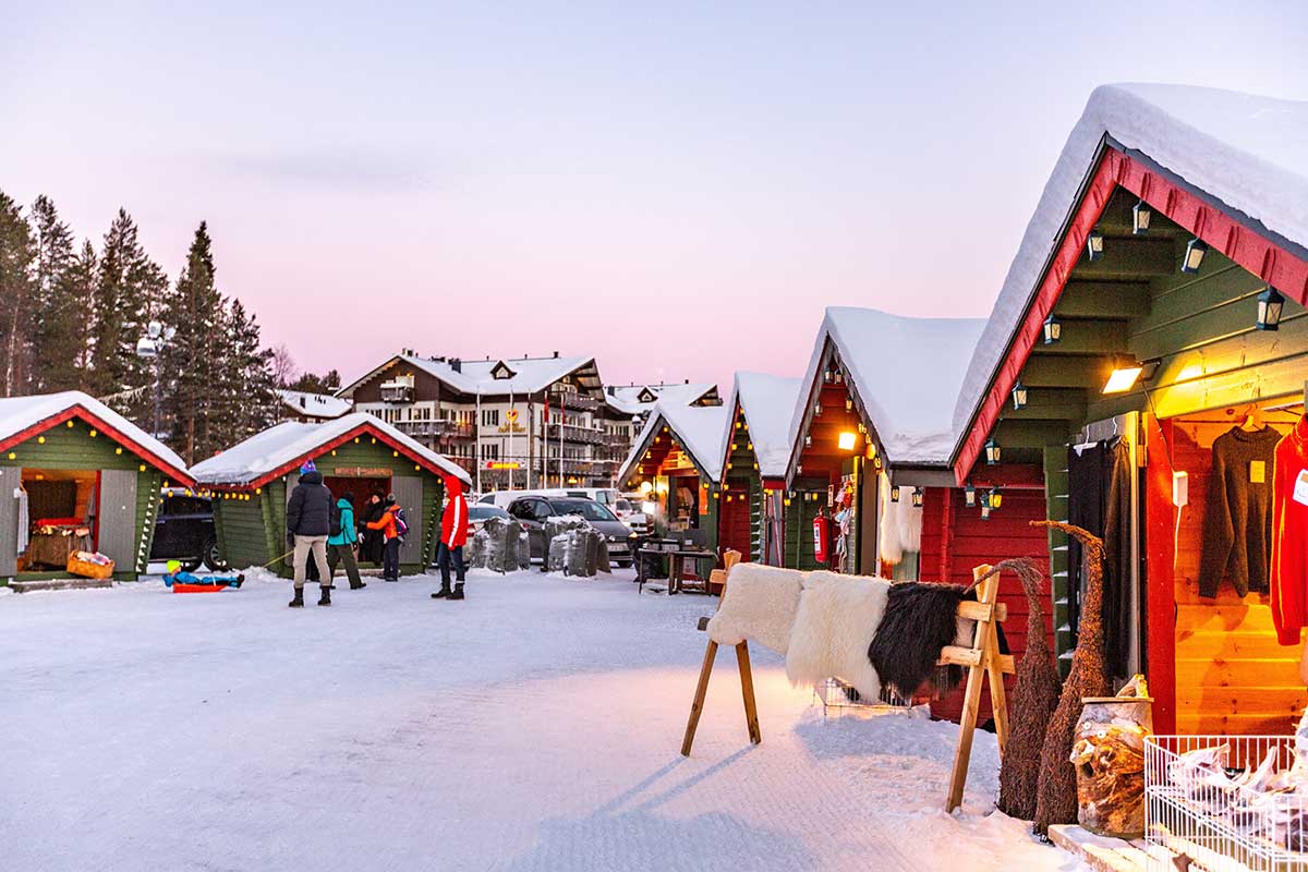 Santa Claus Village in Rovaniemi, Finland, features Santa's official post office, reindeer sleigh rides, and festive decorations, offering visitors a magical Christmas experience in the Arctic Circle.