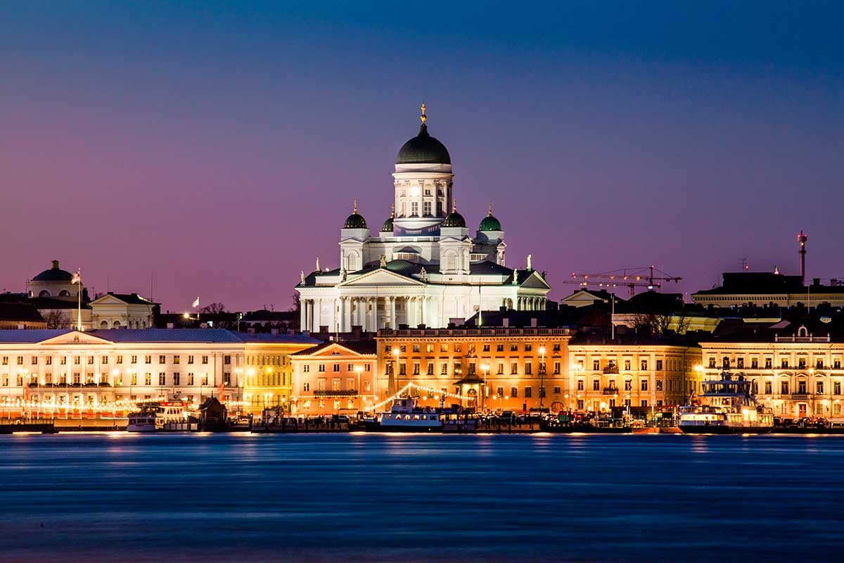 Helsinki Cathedral, a neoclassical landmark in Senate Square, Finland, features a distinctive green dome, white facade, and grand staircase, representing the city's architectural heritage and serving as a prominent religious and cultural symbol.