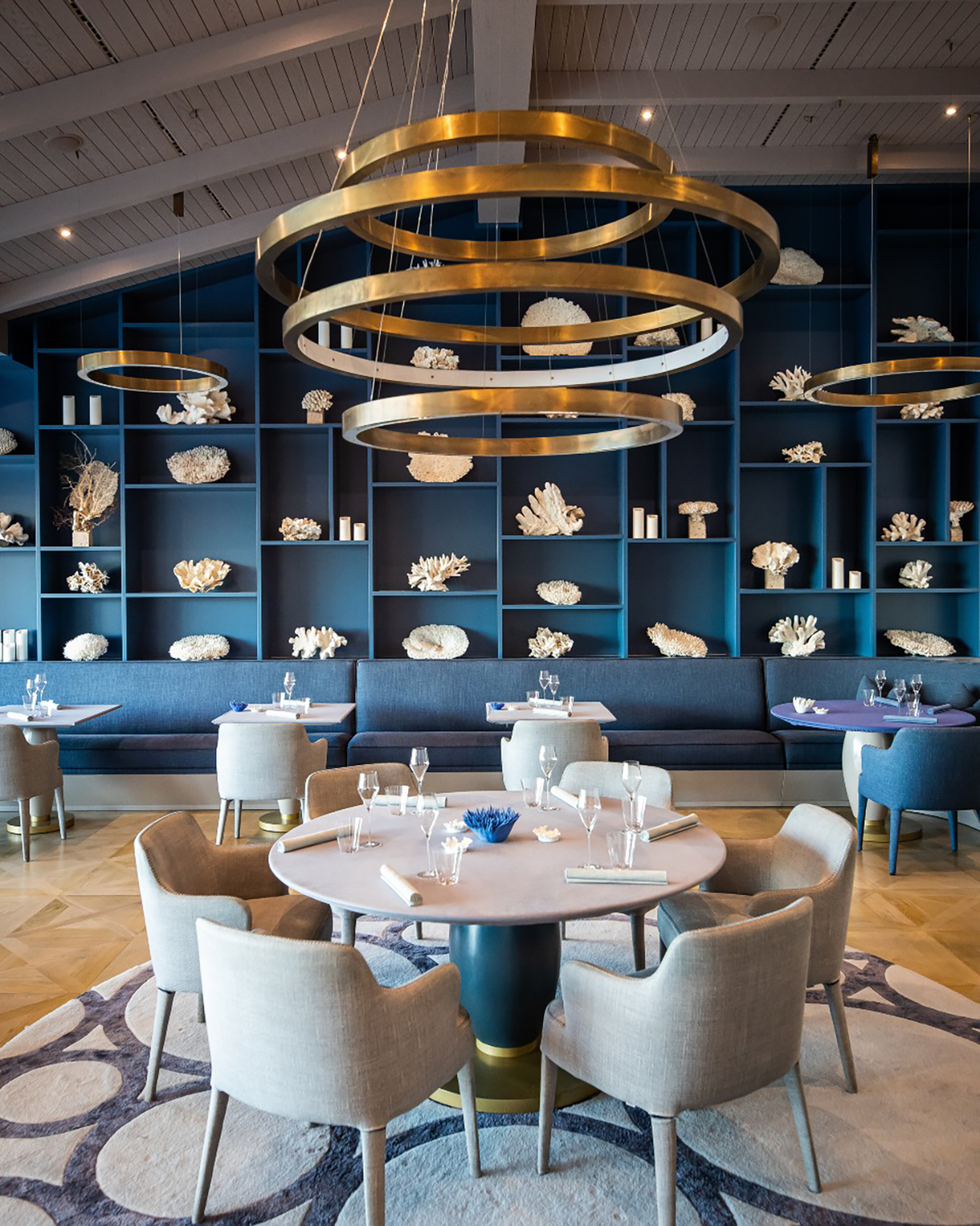 Elegant dining room at Ocean Restaurant, Algarve, featuring panoramic Atlantic Ocean views, showcasing its two Michelin star award-winning cuisine.