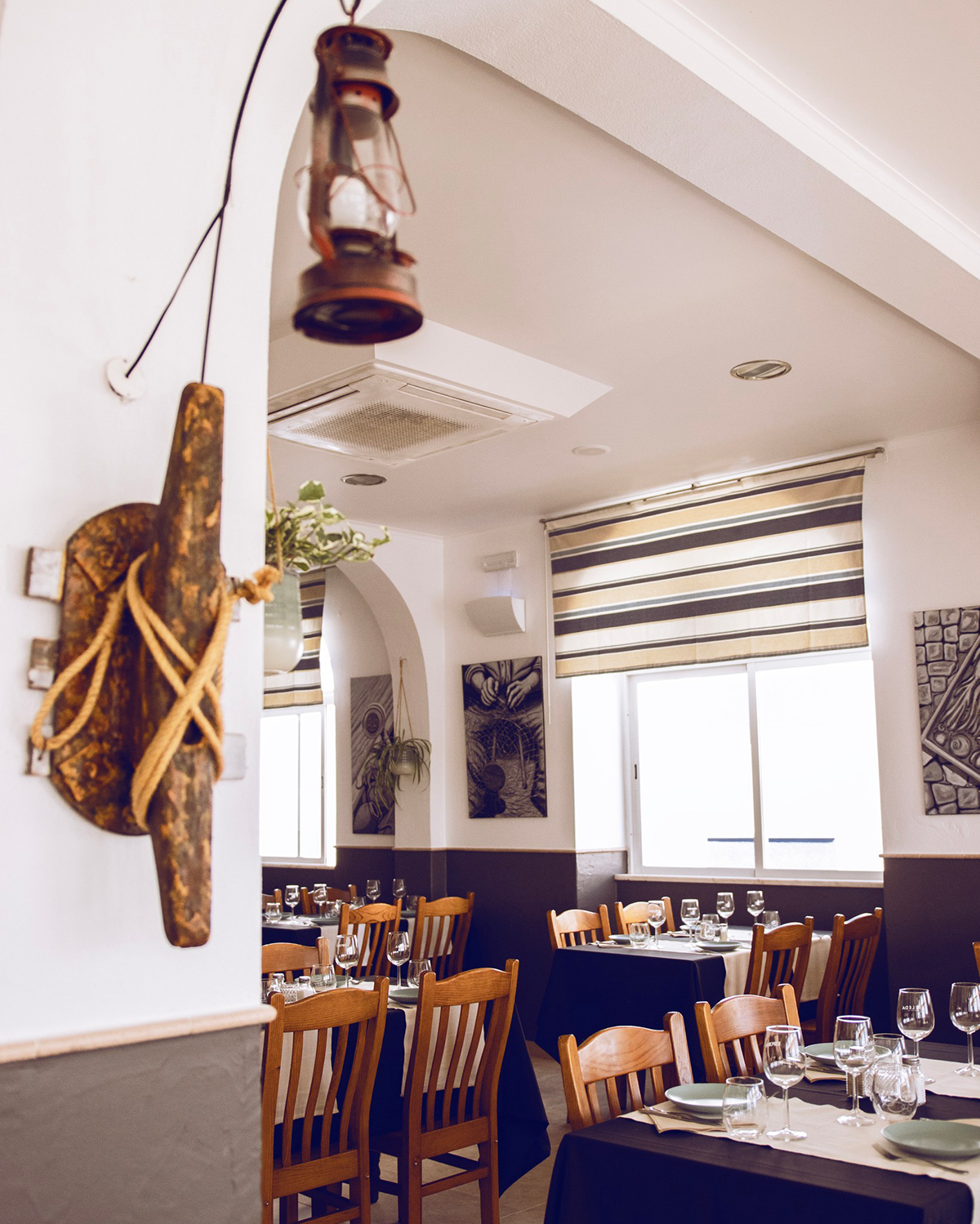 Rustic charm at Restaurante O Capelo, featuring traditional Portuguese cuisine with a focus on fresh seafood and regional dishes.