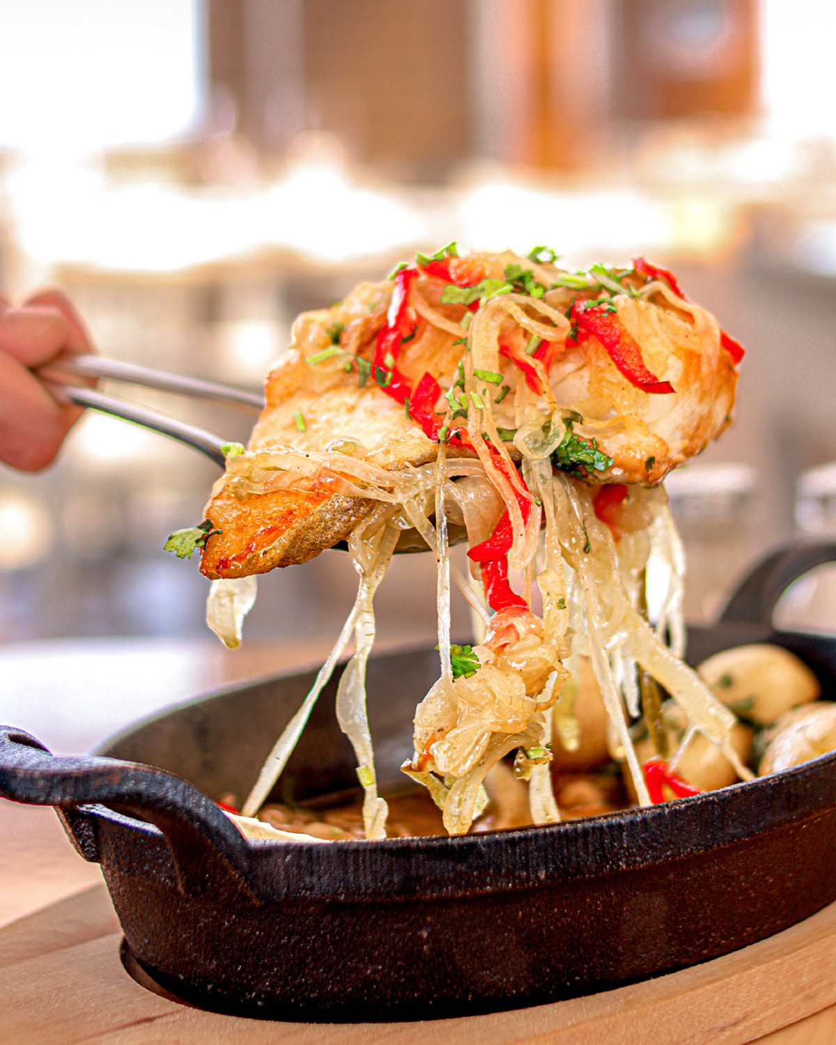 Seafood dishes at Restaurante 2 Passos, emphasizing the restaurant's focus on fresh, locally sourced ingredients and coastal flavors.