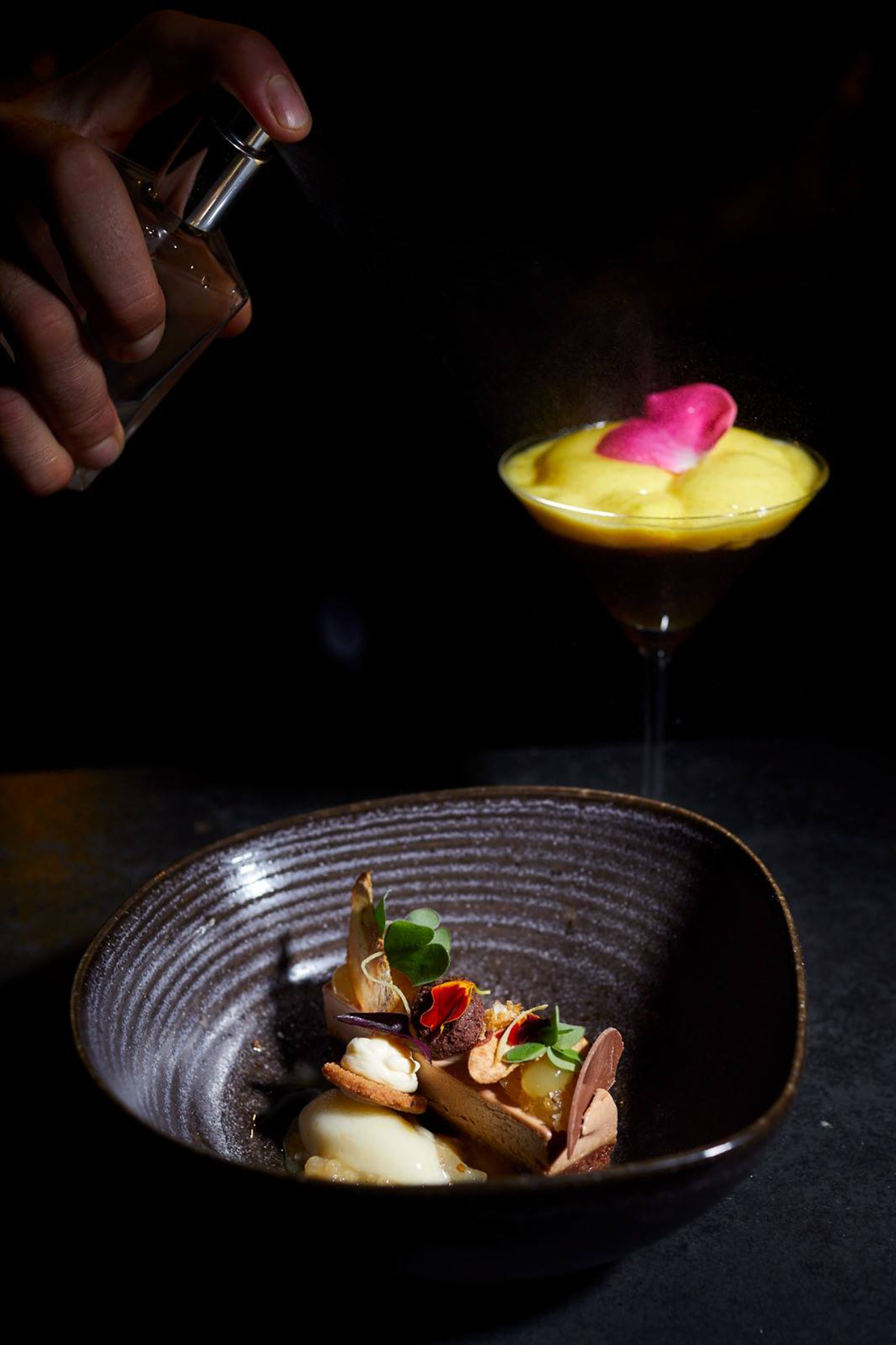 Gourmet dishes at Vila Joya Restaurant, emphasizing artistic presentation and the use of fresh, seasonal ingredients in a fine dining setting.