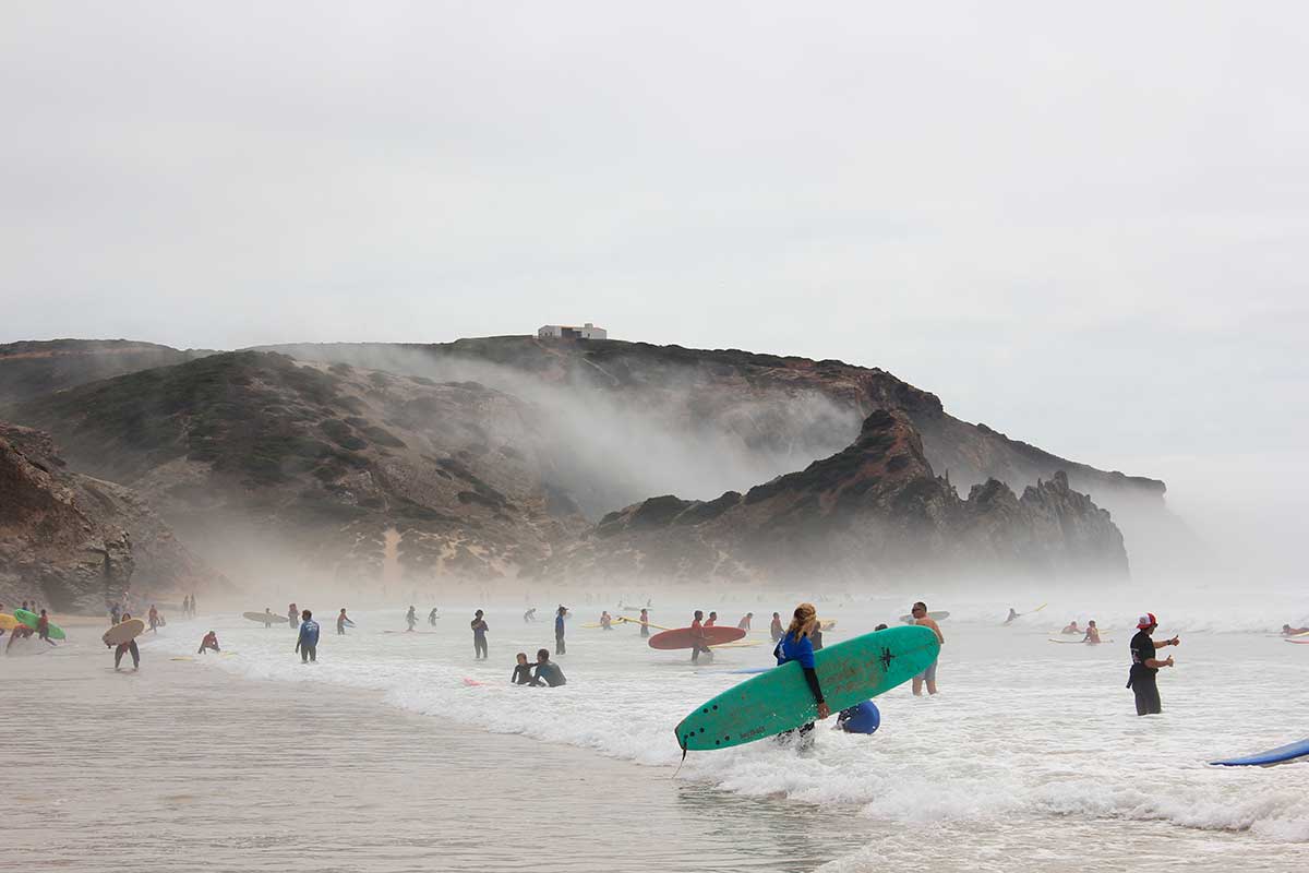 Praia do Amado, with its consistent swells, varied breaks, and sandy bottom, is a premier surfing destination on the Vicentina Coast, offering both beginner-friendly waves and challenging rides for experienced surfers.