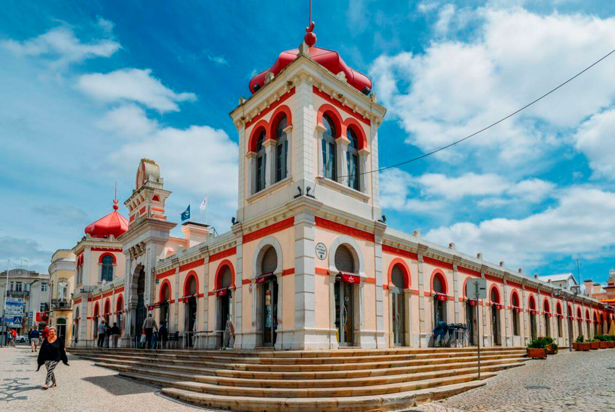 The Loulé Market, a vibrant and historic market in the Algarve, is renowned for its Moorish-influenced architecture and bustling atmosphere, offering a diverse selection of fresh produce, regional delicacies, handicrafts, and local products, providing an authentic cultural experience.