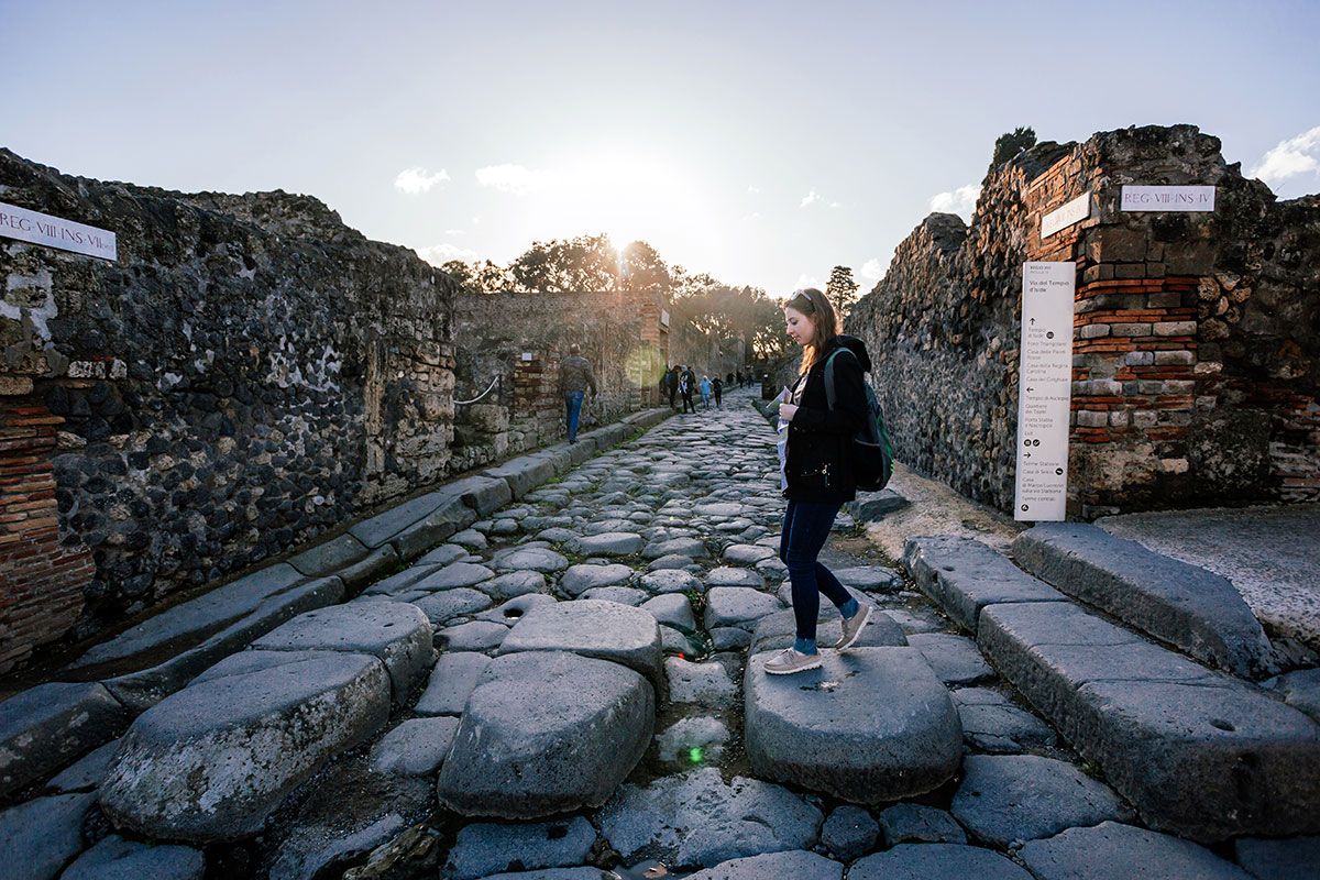 A guided tour of Pompeii's ancient ruins reveals preserved Roman houses, forums, and artifacts, showcasing the city's tragic history and archaeological significance under the shadow of Mount Vesuvius.