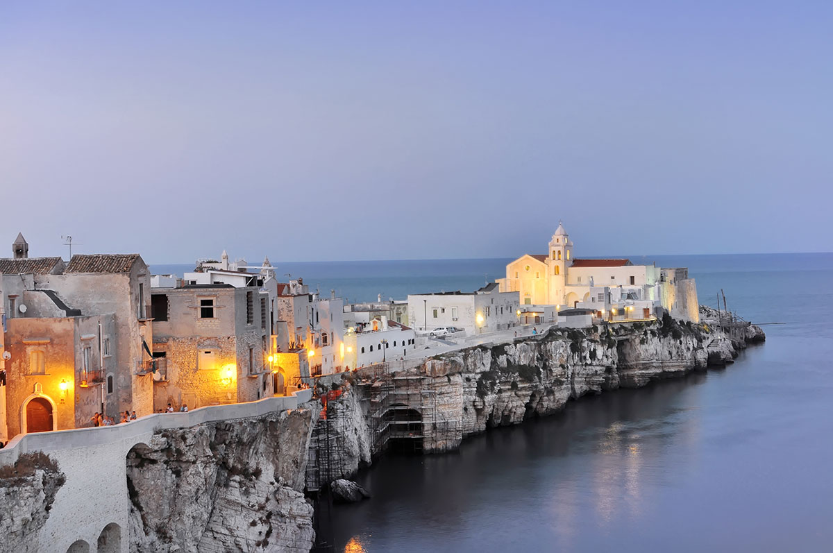 Apulia (Puglia), Italy, features whitewashed towns like Alberobello with its iconic trulli houses, olive groves stretching to the Adriatic Sea, and Baroque architecture in Lecce, showcasing its diverse landscapes and rich cultural heritage.