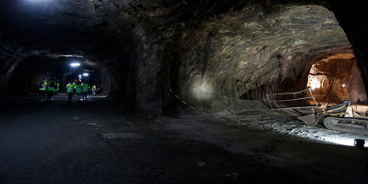 Visiting Loulé salt mine tunnels involves walking through illuminated passages carved into ancient salt rock, revealing the mine's geological formations and historical extraction methods, offering a unique subterranean experience.