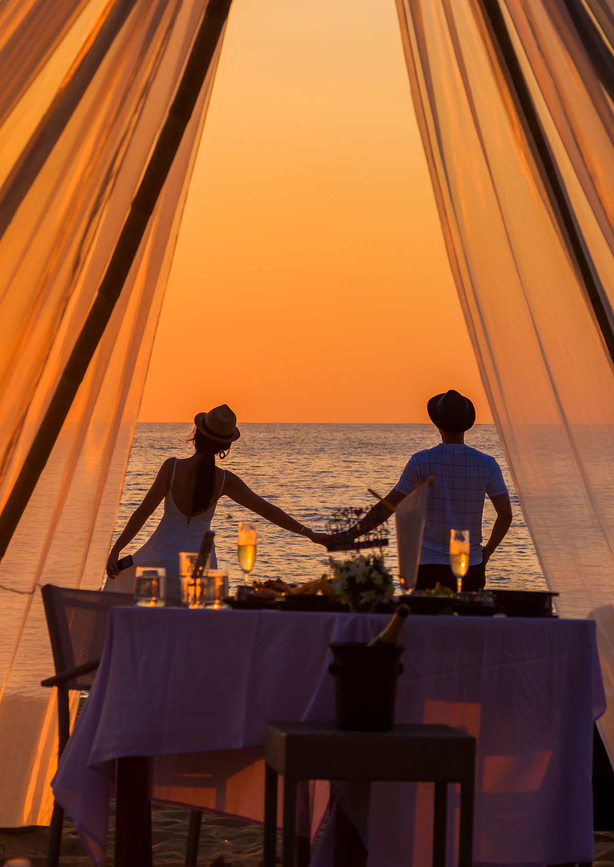 Dinner table for two at the beach