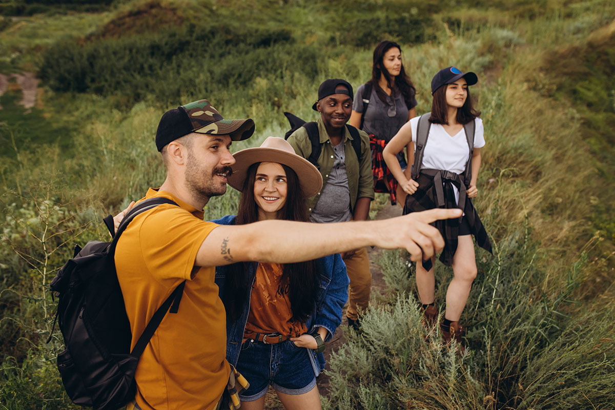 A solo traveler enjoying a group tour experience with other travelers.