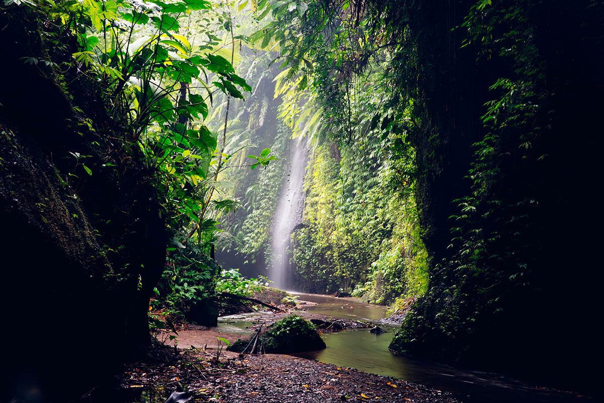 Light shining through Tukad Cepung Waterfall cave