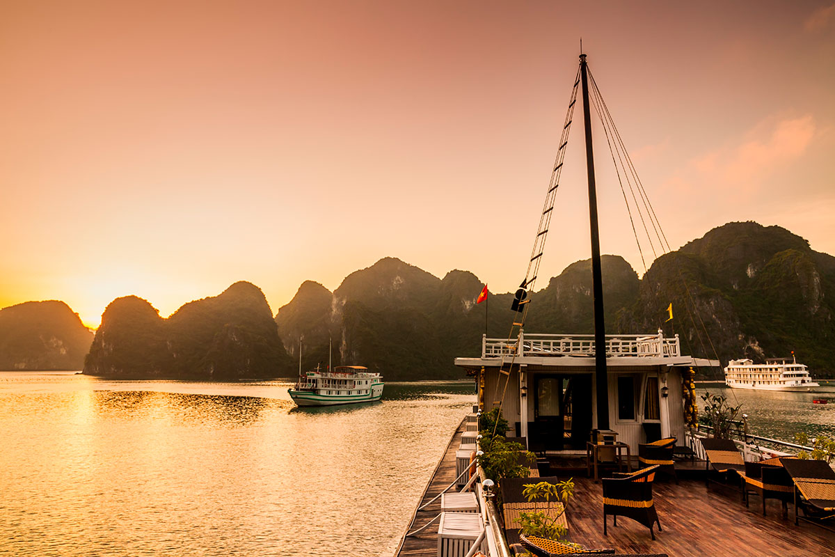 Experience the magic of Hạ Long Bay: Sunrise Tai Chi on a cruise ship deck, a unique way to start your day