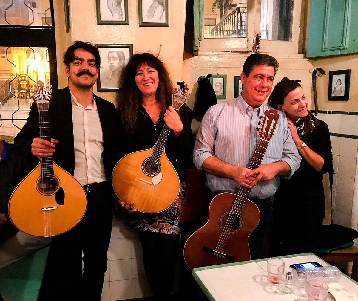 Traditional Fado singer performing in a small Portuguese tavern
