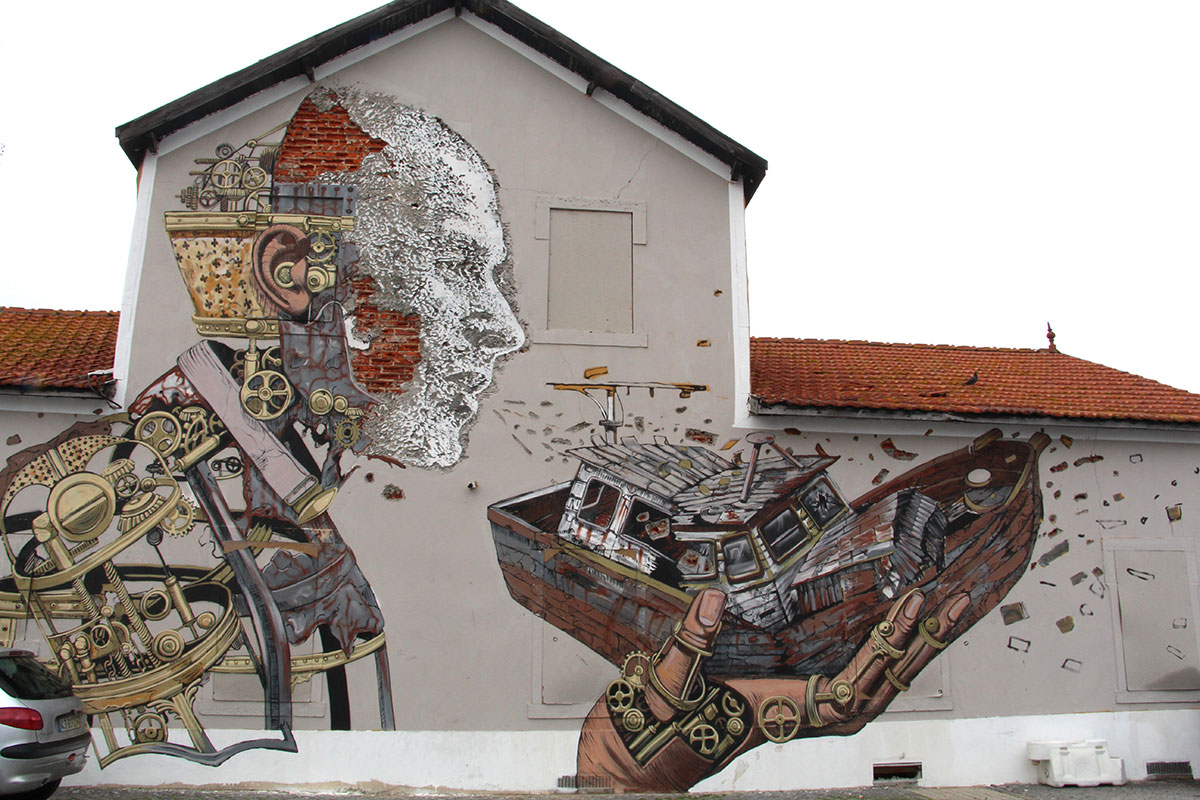 Portrait carved into a wall by Vhils in Lisbon, showcasing his unique bas-relief technique.
