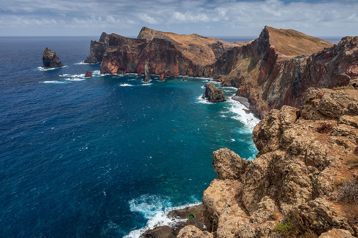 Steep cliffs of Ponta de São Lourenço meeting the Atlantic Ocean