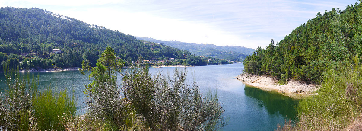 Panoramic view of Peneda-Gerês National Park showcasing its lush forests and mountainous terrain.