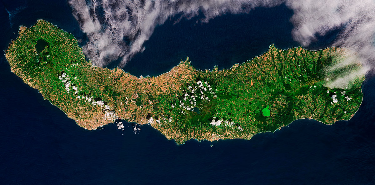 Aerial view of lush green hills and forests in São Miguel Island