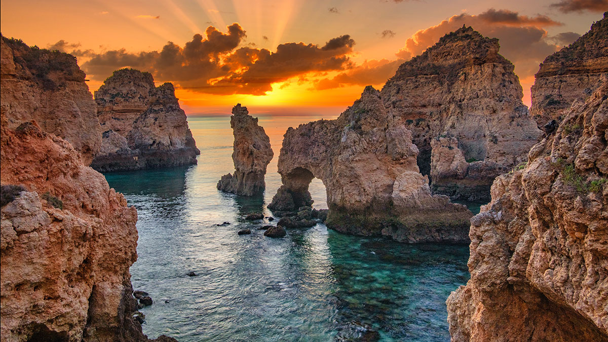 Golden sea cliffs and arches at Ponta da Piedade, Lagos
