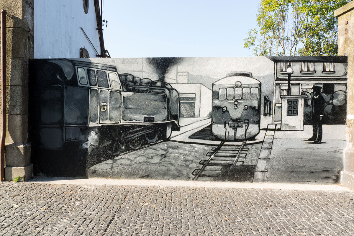 Colorful street mural by local artist in Porto
