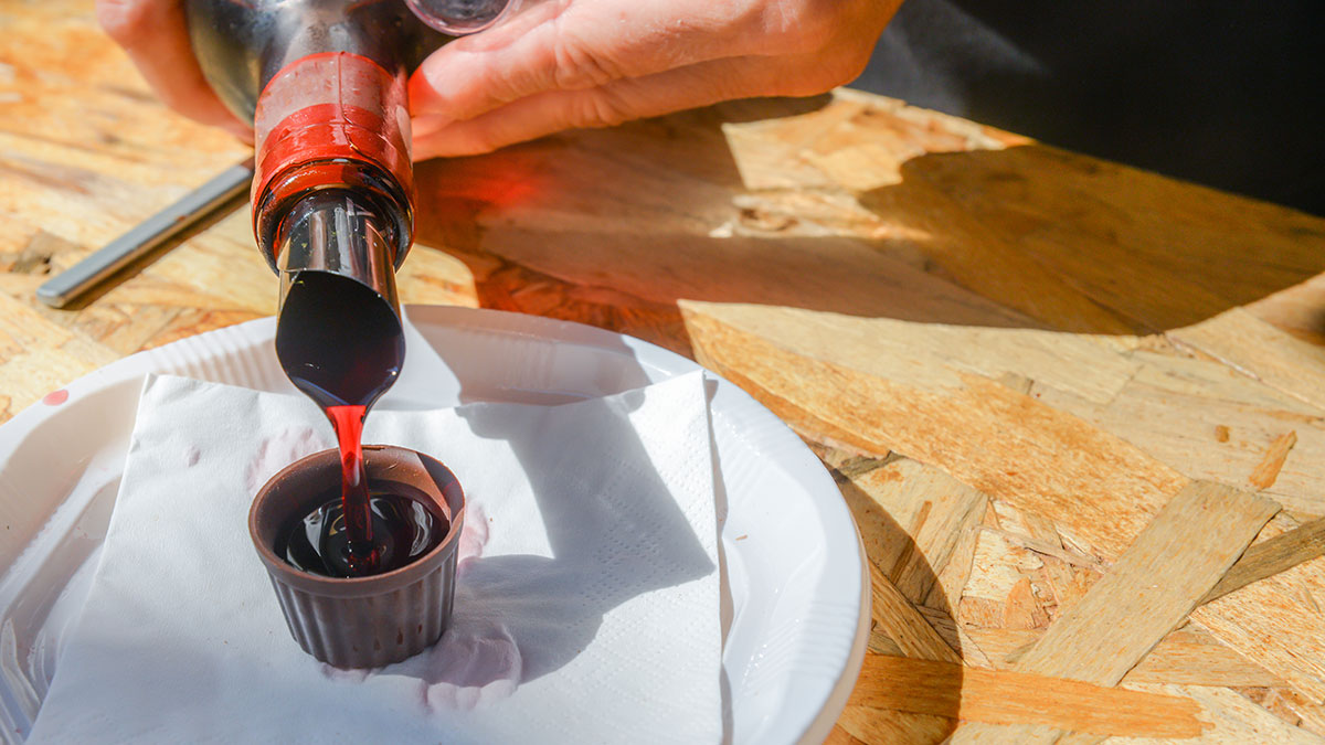 Traditional Ginjinha liqueur served in edible chocolate cups, a specialty of Óbidos.