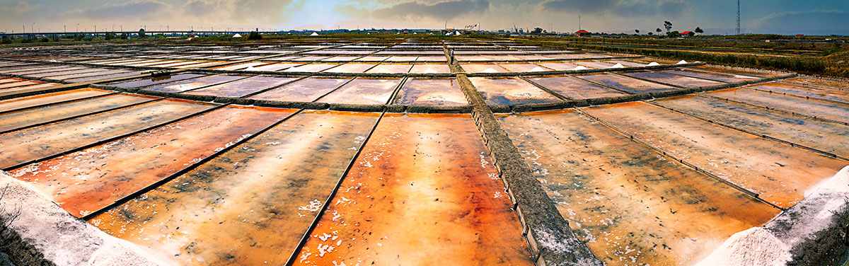 Traditional salt pans (salinas) used for salt harvesting in Aveiro, Portugal.