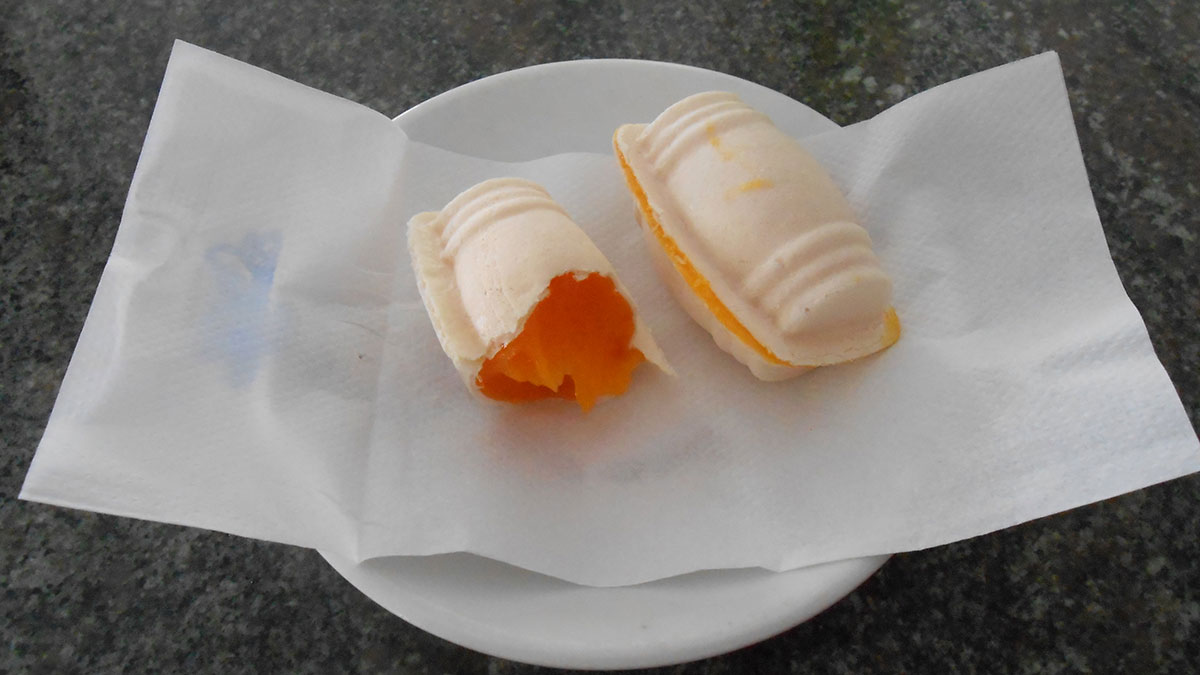 Plate of Ovos Moles, traditional Portuguese sweets from Aveiro, made of egg yolks and sugar.