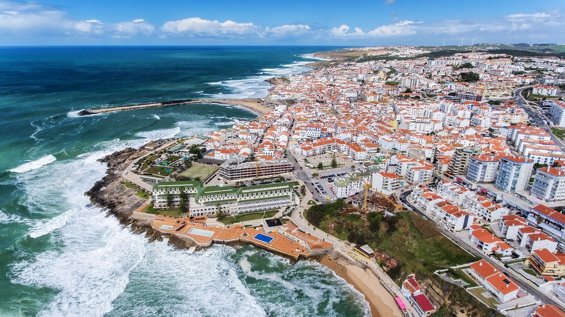 Aerial view of the town of Ericeira coasts and streets.