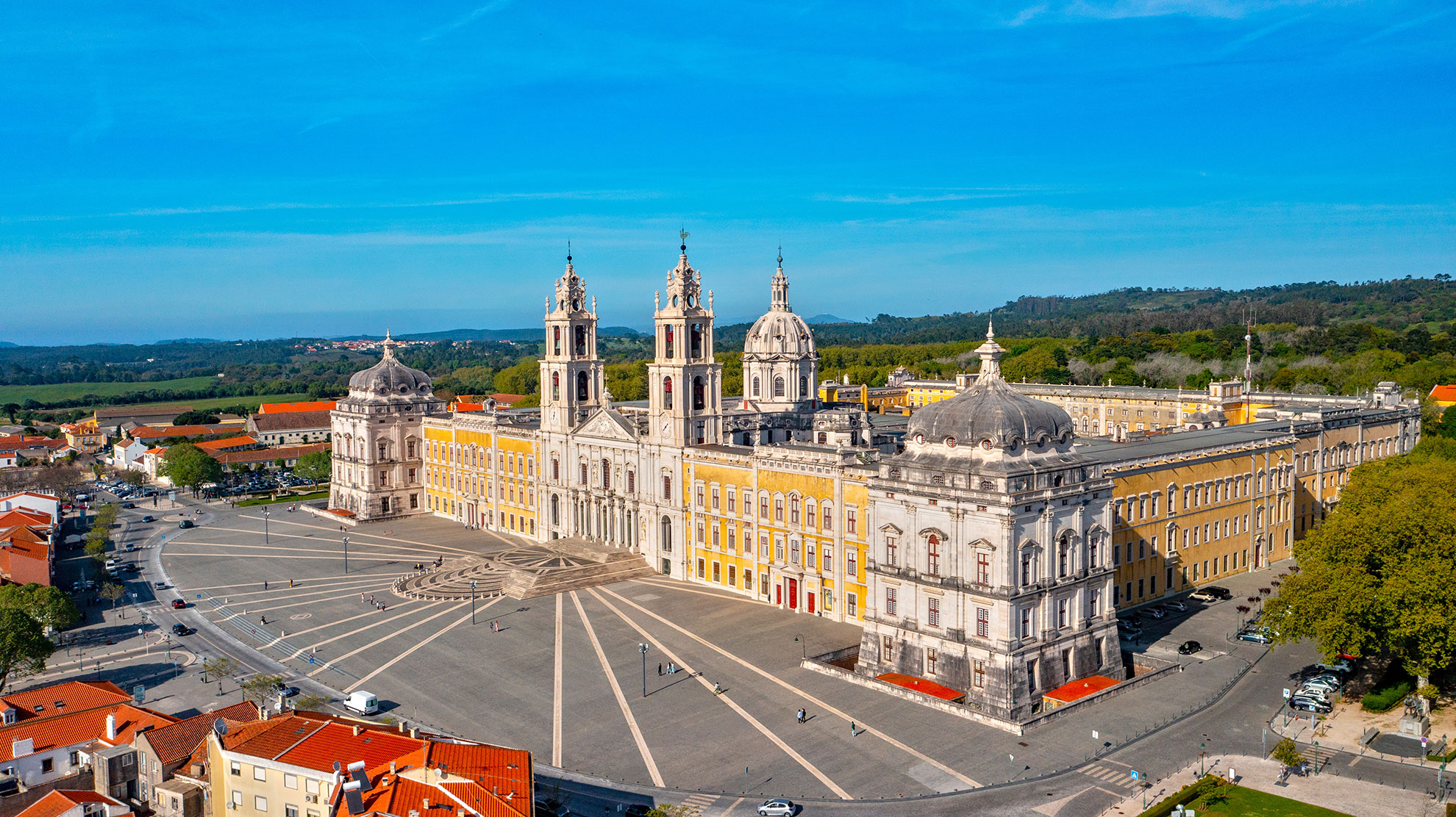 Aerial view of the Palace of Mafra. Unesco world heritage in Portugal. Aerial top view of the Royal Convent and Palace of Mafra, baroque and neoclassical palace.