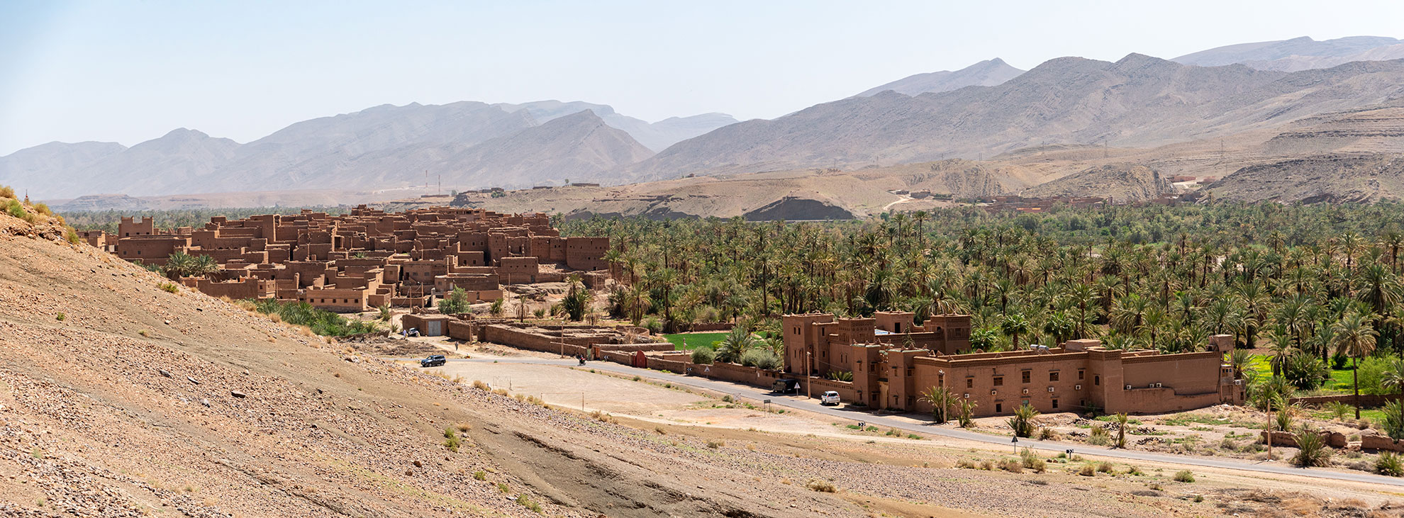 View of Tamenougalt village with its typical clay houses in the Draa valley