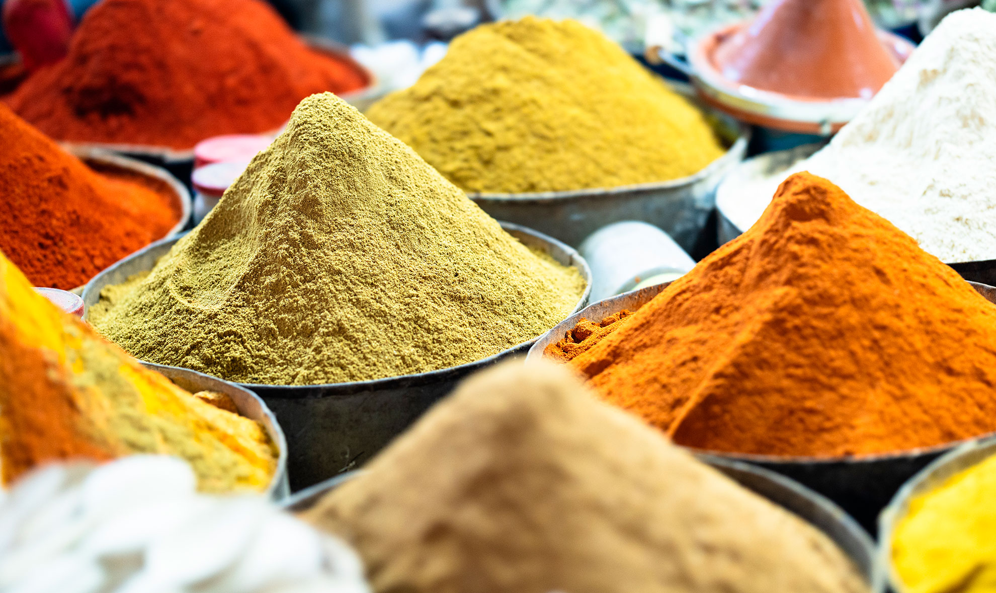 Colorful spices on display at a traditional market. Rissani. Morocco