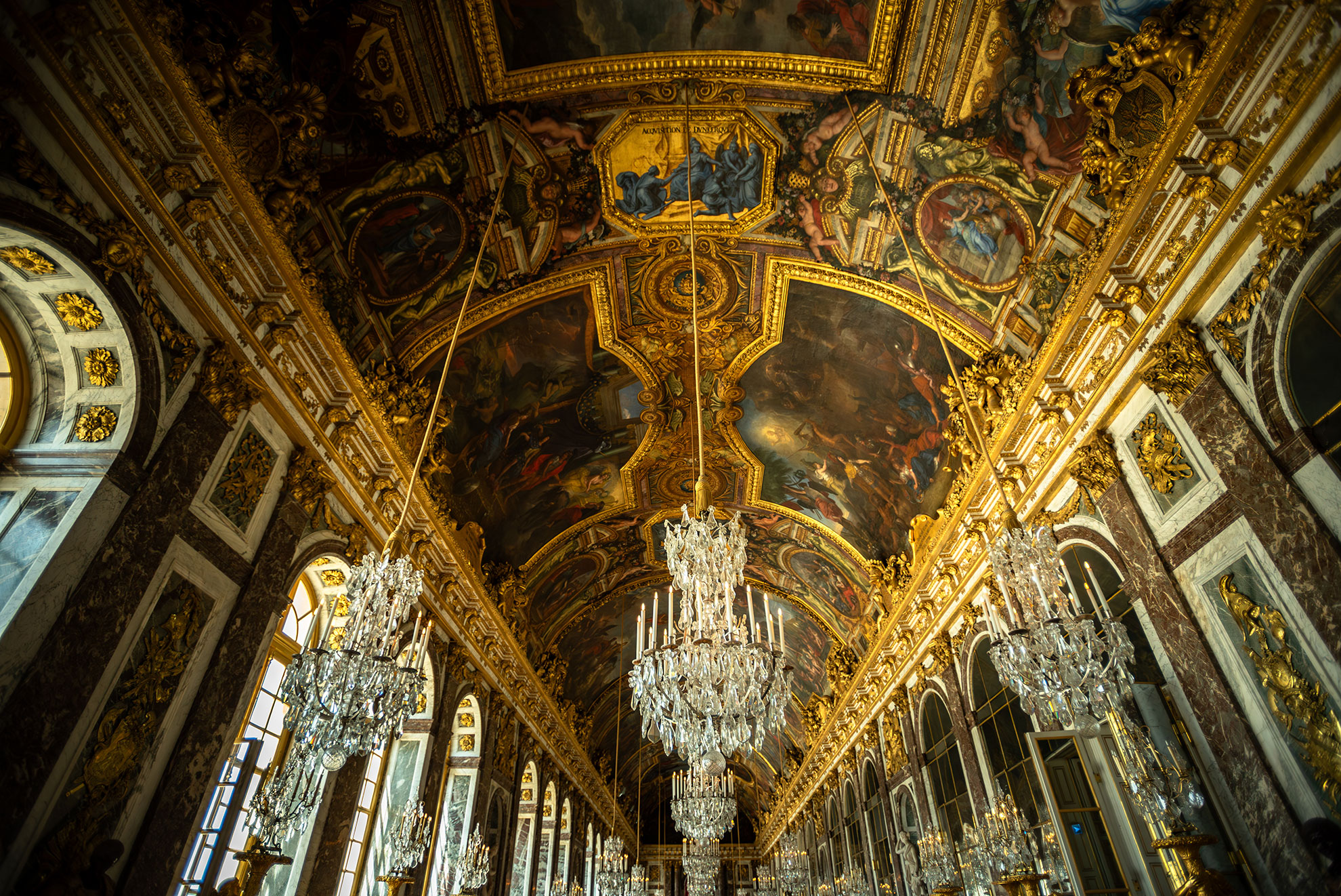 Iconic Ceiling Frescoes and Chandeliers in the Hall of Mirrors of Versailles Palace - Versailles, France