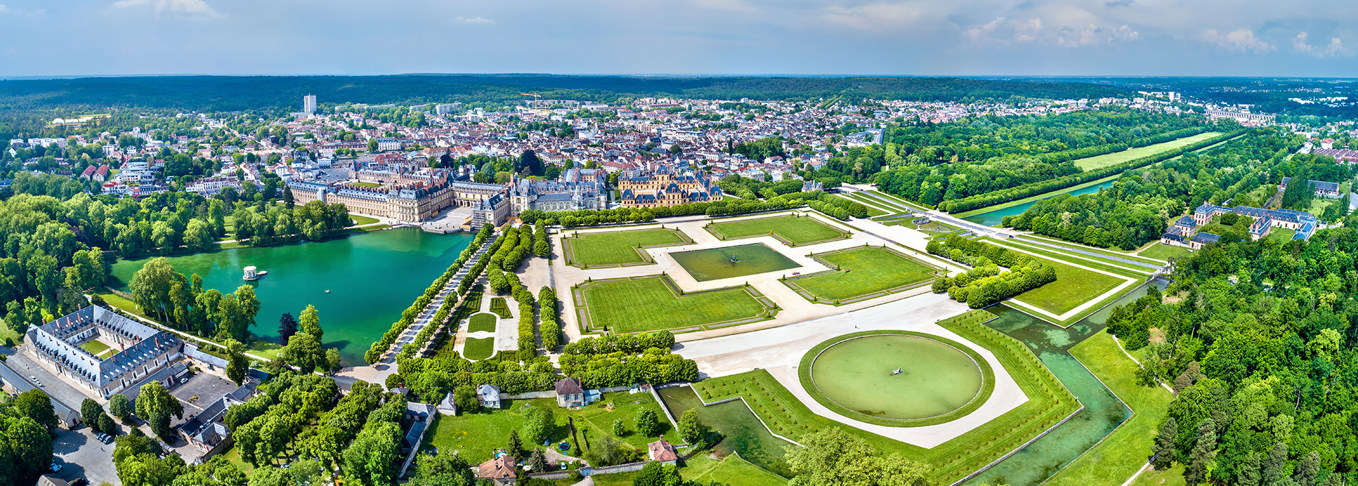 Aerial view of Chateau de Fontainebleau with its gardens, a UNESCO World Heritage Site in France