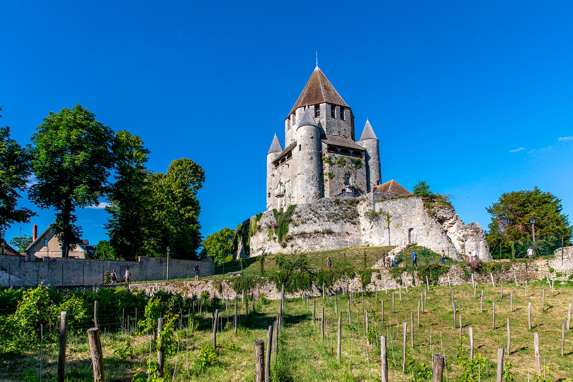 Provins, France - May 31, 2020: Cesar tower (1152 - 1181, built under reign of Henry Liberal) - landmark and emblem of Provins, smal medieval village near Paris, France