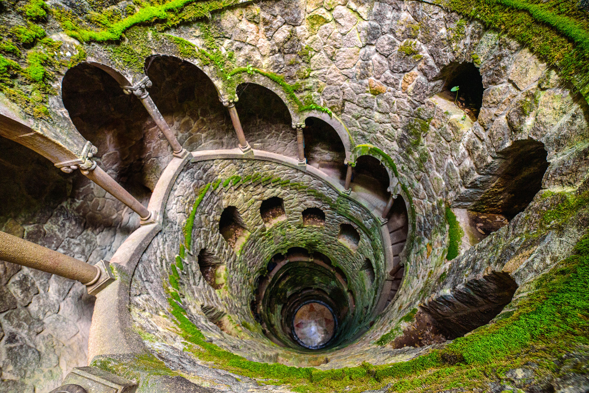 Spiral Initiation Well of Quinta da Regaleira in Sintra, Portugal with Mystical Atmosphere