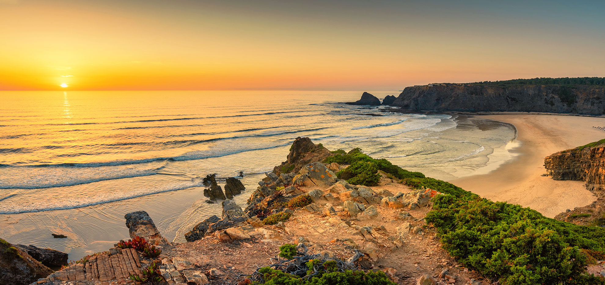 Sunset over the Portuguese west coast and Praia de Odeceixe beach, Costa Vicentina Natural Park