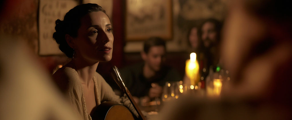 Fado singer performing in a traditional Lisbon taberna in Alfama