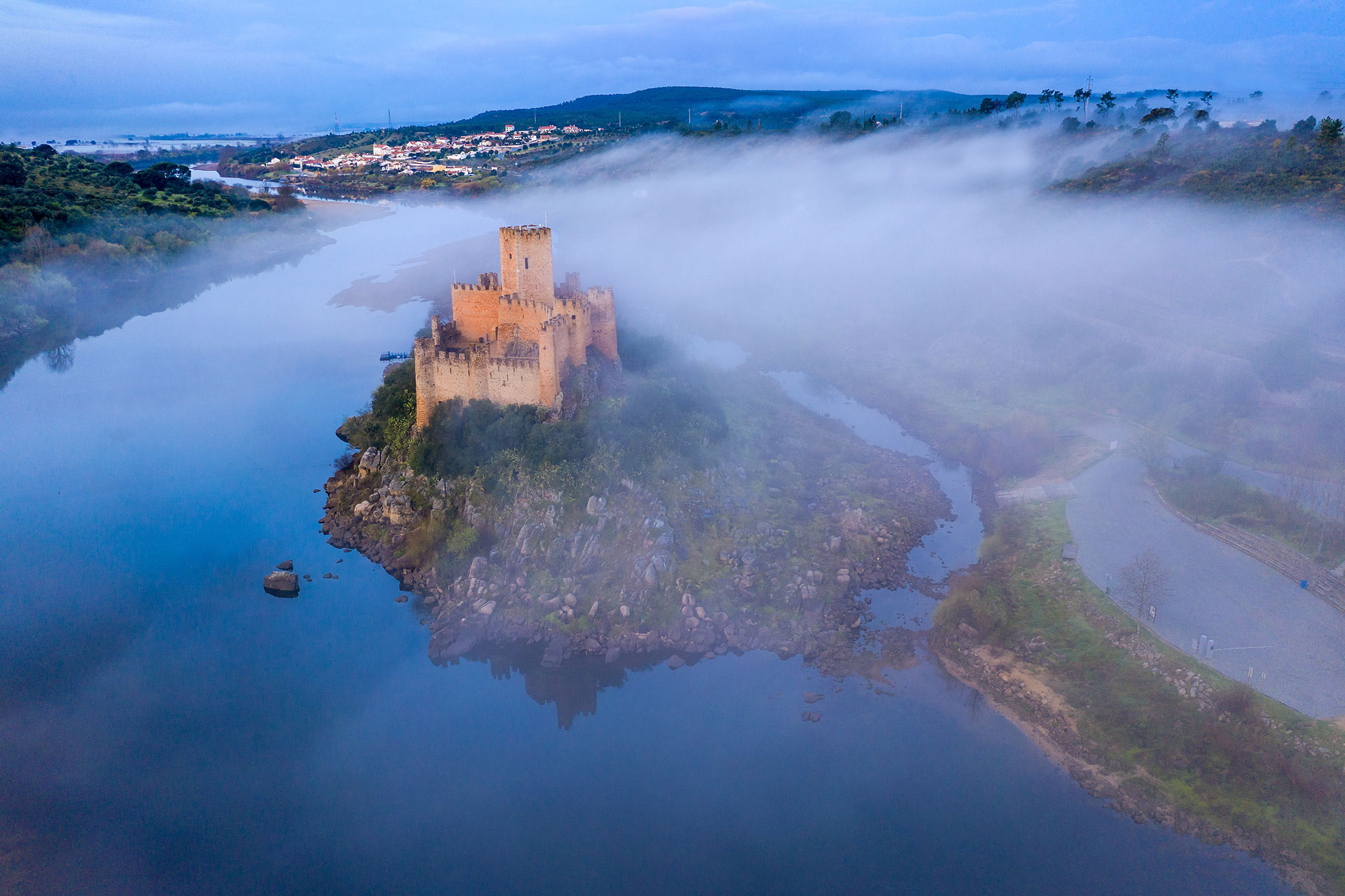 Almourol Castle rising from the Tagus River