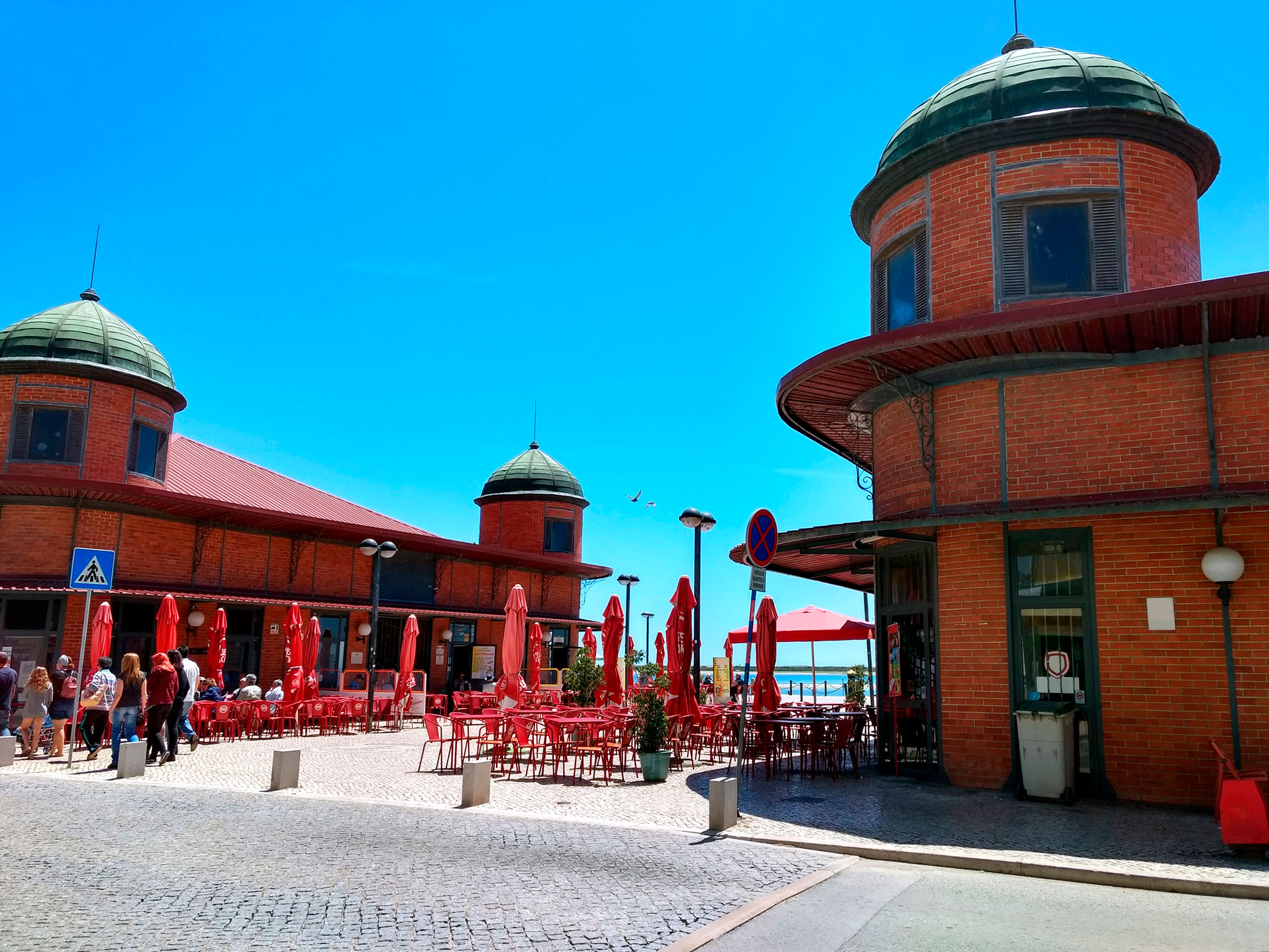 The red-brick twin market pavilions of Olhão near the waterfront