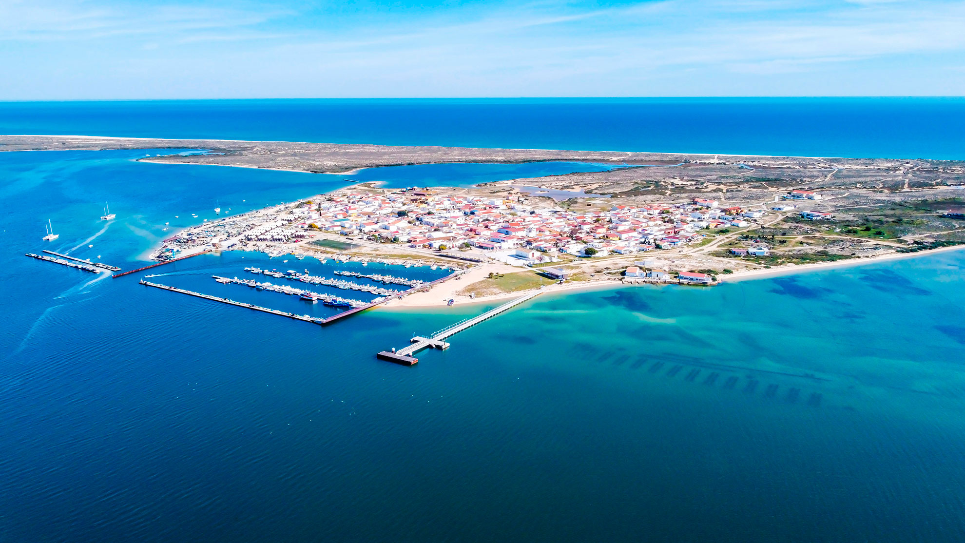 The car-free fishing village of Ilha da Culatra seen from the water