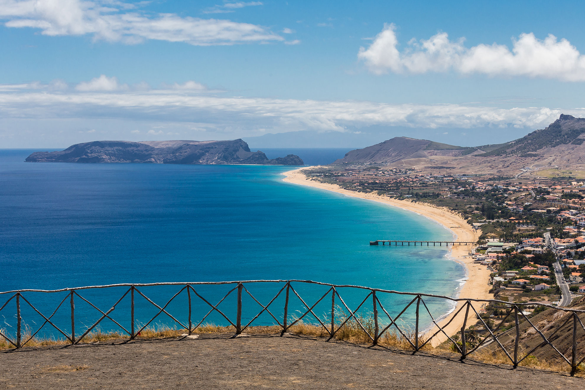Aerial view of Porto Santo's nine-kilometre golden beach meeting turquoise Atlantic waters