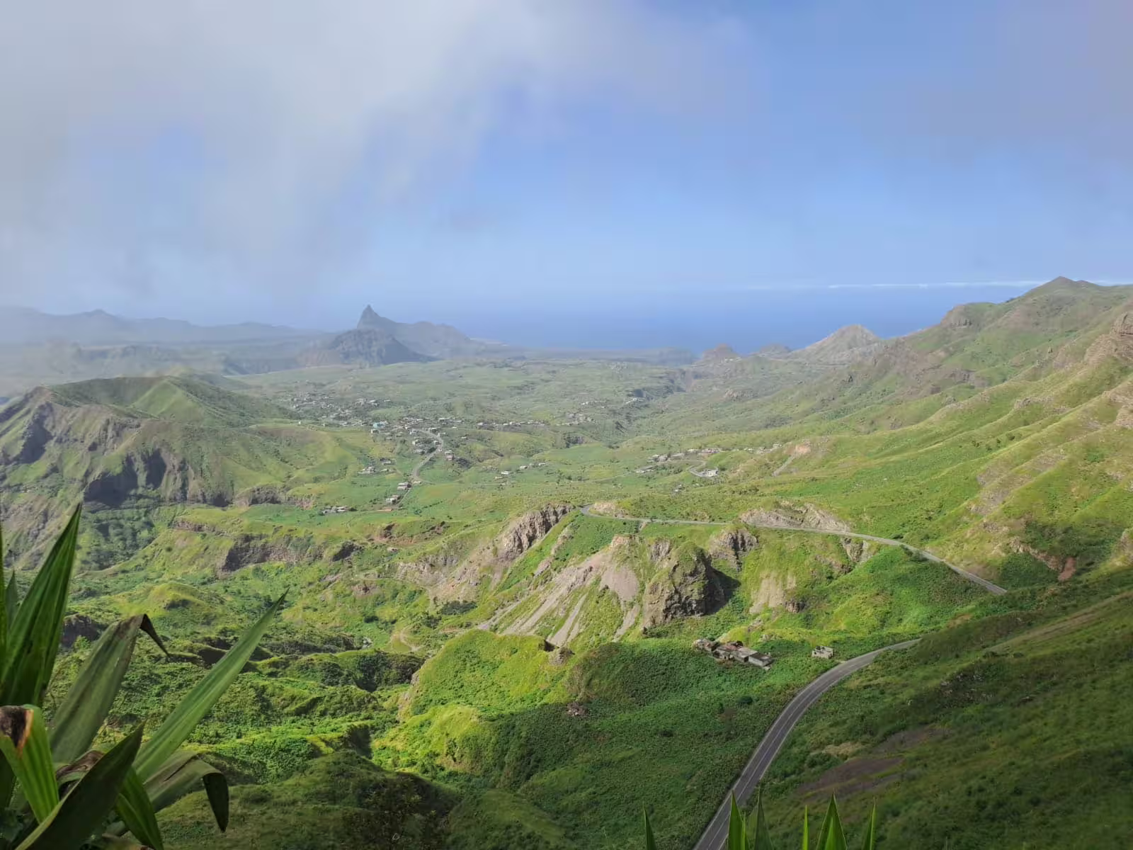 Panoramic view from Serra Malagueta Natural Park hiking trail on Santiago Island with the ocean visible in the distance and Tarrafal beach below