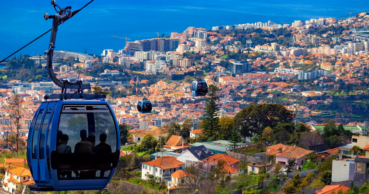 Funchal harbour panorama with lush green hills and Atlantic Ocean below